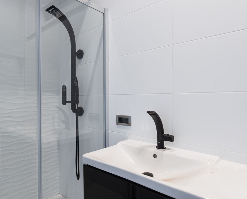 Why black grout lines return in HDB bathrooms fast
