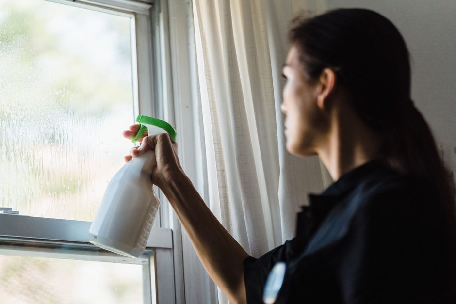 Photo by Liliana Drew on Pexels Woman spraying cleaner on a window frame in a bright room. Photo by Liliana Drew on Pexels