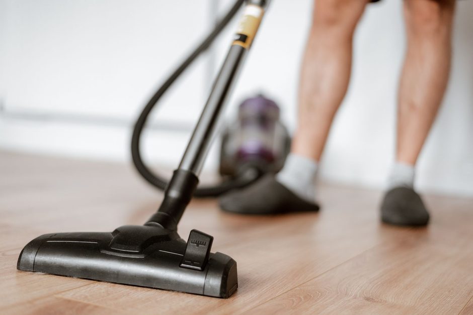 Photo by Anete Lusina on Pexels Person vacuuming a wooden floor with an upright vacuum cleaner in a bright room. Photo by Anete Lusina on Pexels